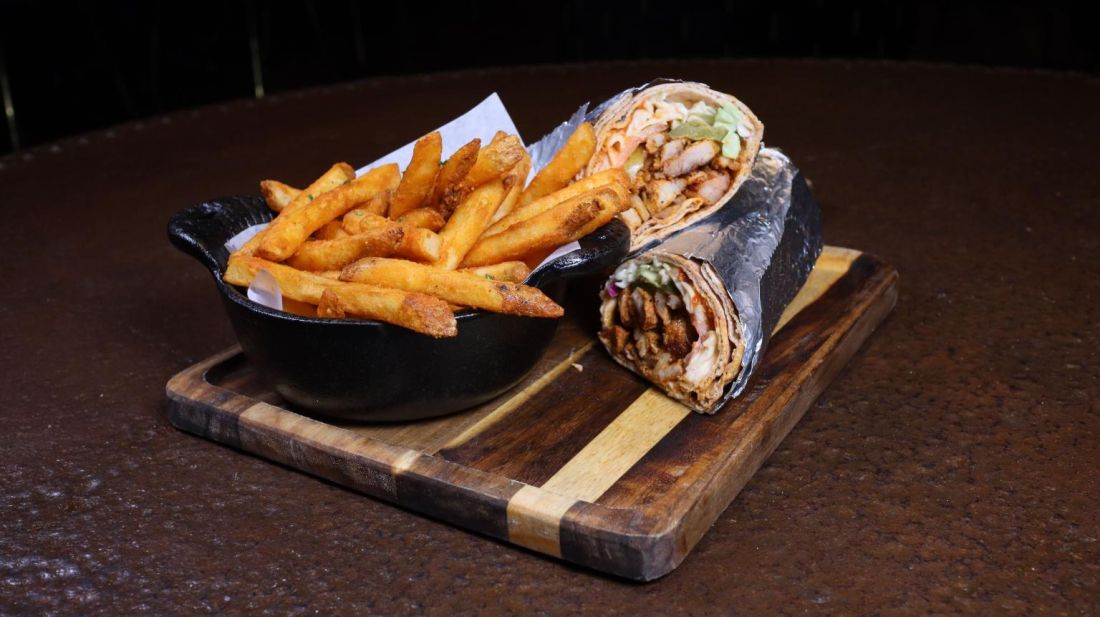 Wrap served with seasoned fries