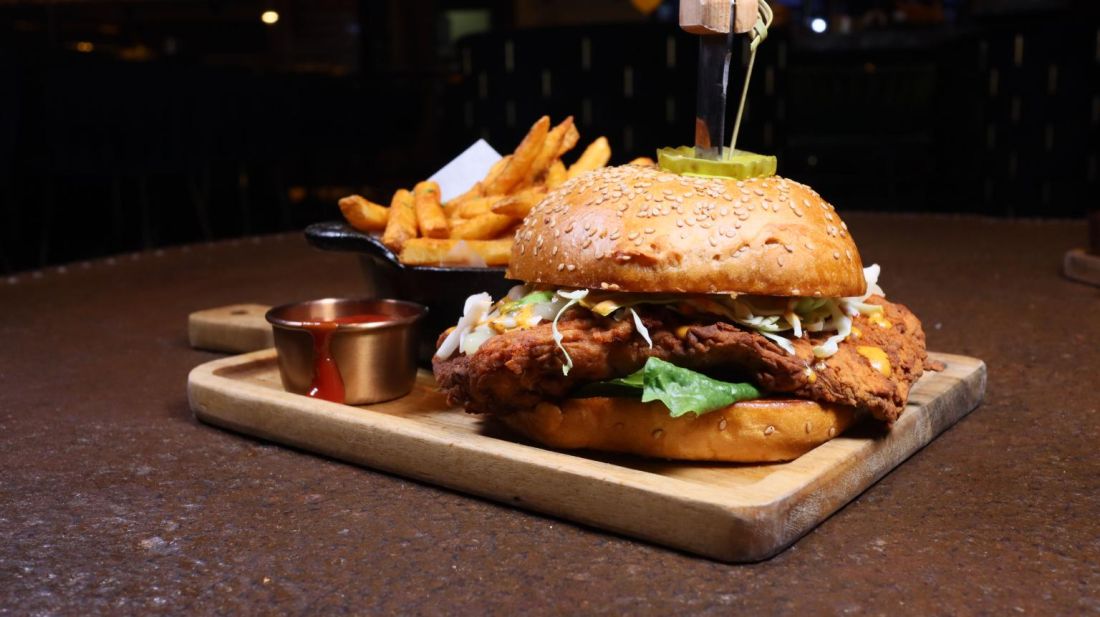 Crispy chicken sandwich with fries